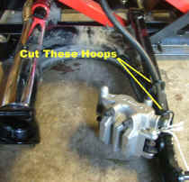 /files/includes/images/dh_swingarm_armoff11.jpg (119572 bytes)
