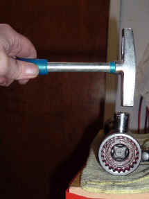 /files/includes/images/ujoint_removecaps.jpg (108009 bytes)